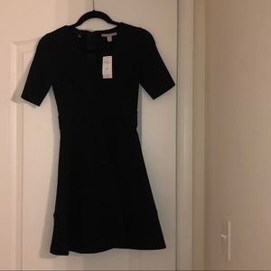 Black dress with gold zipper